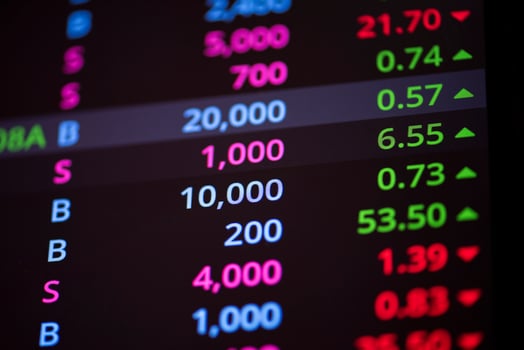 Stock market graph data board on screen monitor for investment business analysis finance in stock exchange market with number ticker up and down money price - photo