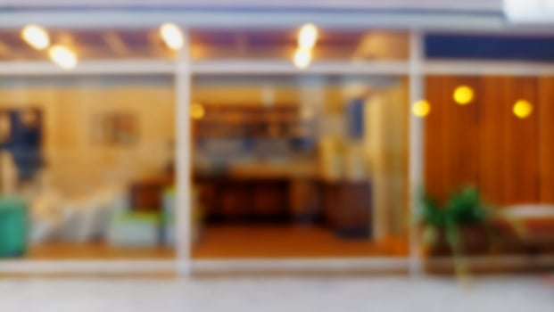 Blurred background of coffee shop and coffee roastery room with sparkling lights photo