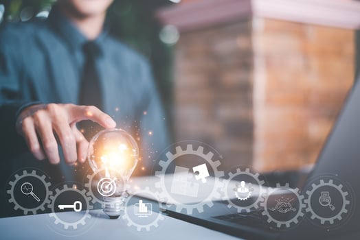 solution concept and demonstrating leadership strategies,Creativity that will lead business in the right direction,with innovation and brain power from brainstorming,Businessman pointing light bulb photo