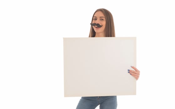 smiling girl holding blank sign board. studio portrait of young woman with sign card. isolated. photo