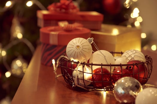 Decorated Christmas tree on blurred, sparkling and fairy background photo
