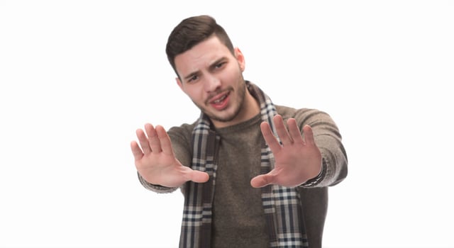 man happy smile standing hand pointing to empty space on white background. photo
