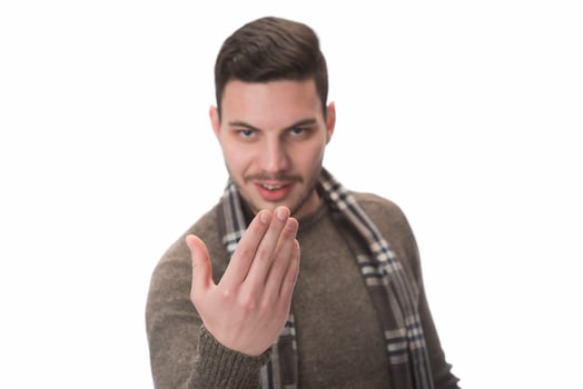 man happy smile standing hand pointing to empty space on white background. photo