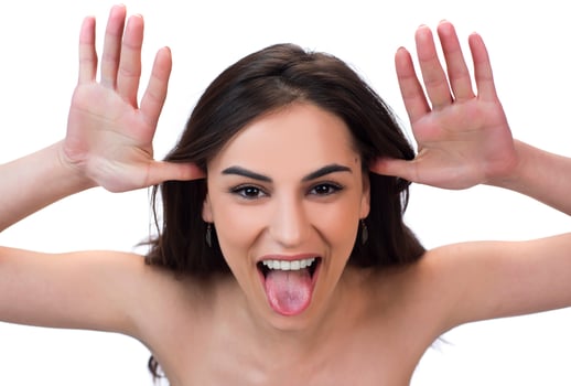 woman with weird expression isolated on white photo