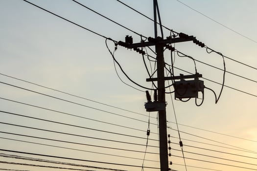 consumer medium-voltage power pole is the people to use energy and small industry in the warm and romantic evening sky atmosphere. photo