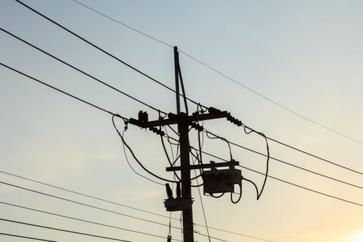consumer medium-voltage power pole is the people to use energy and small industry in the warm and romantic evening sky atmosphere. photo