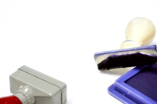 Ink cartridges and stamper isolate on white background. photo