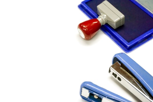 Ink cartridges and stamper with stapler isolate on white background. photo