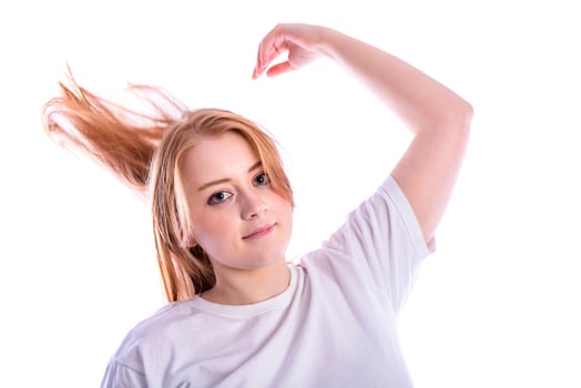 Beautiful Girl holding her Hair in hand photo