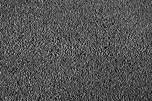 No signal on television or computer screen. Abstract background with black and white grainy noise effect in monitor. photo