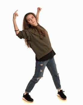 Beauty stylish woman posing in fashionable clothes in studio. Casual style, beauty accessories. High fashion urban style photo