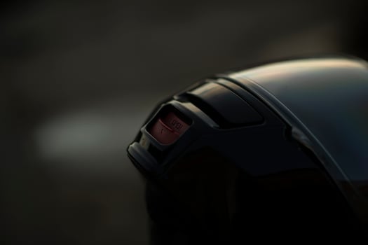 Motorcyclist's helmet is black. Biker head protection. photo