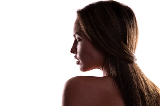 artistic view of depressed female model posing in studio photo