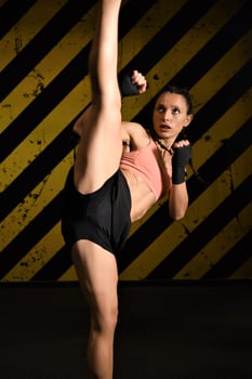 MMA woman fighter tough chick boxer punch pose pretty exercise training cross fit athlete photo