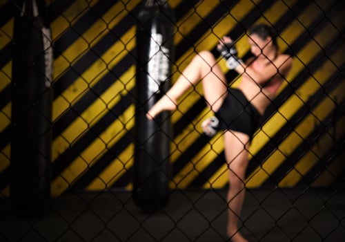 MMA woman fighter tough chick boxer punch pose pretty exercise training cross fit athlete photo