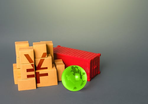 Boxes of goods and chinese yuan or japanese yen symbol. Production, warehousing storage and shipping logistics worldwide. World trade economy. Manufacture products. Markets. Business globalization photo