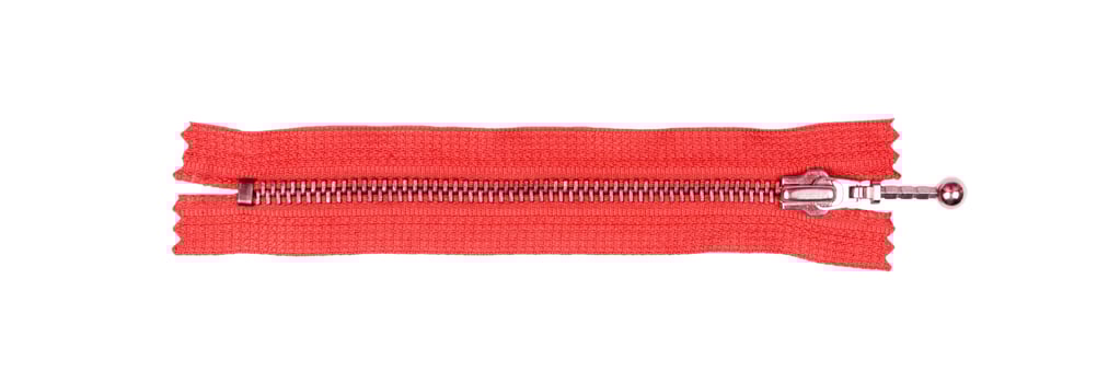 red zipper isolated on white. top view photo