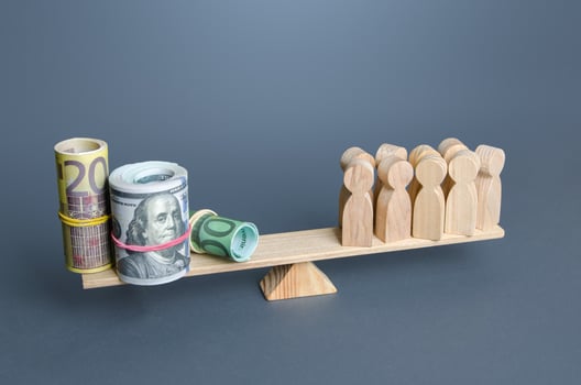 People and money on the scales. Concept of wages for employees and workers. Financial support and charity funding. Taxpayers pay taxes. Generation of profits and revenues. Subsidies, social benefits. photo