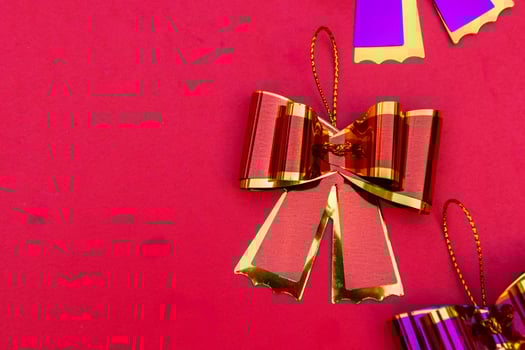ribbon bow on red background , geeting card and copy space photo