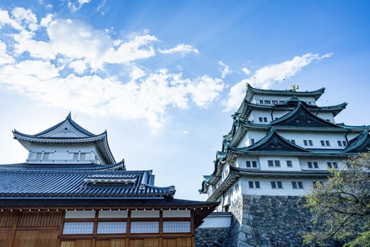 Nagoya castle with a clear sky during autumn leaves seasoning. Nagoya castle is a top landmark in Chubu central of Japan and has samurai as the castle symbol. photo