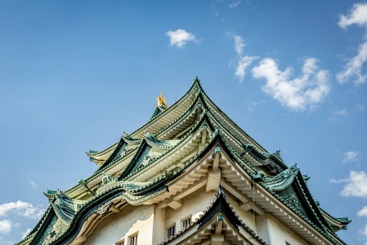 Nagoya castle with a clear sky during autumn leaves seasoning. Nagoya castle is a top landmark in Chubu central of Japan and has samurai as the castle symbol. photo