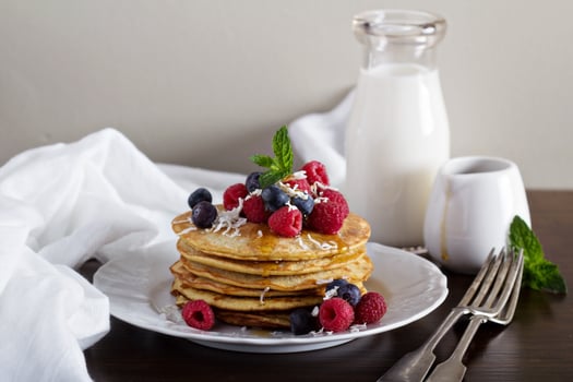 Coconut flour pancakes with fresh berries photo
