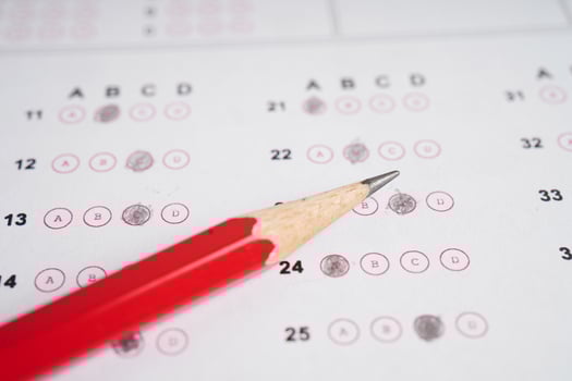 Answer sheets with pencil drawing fill to select choice, education concept. photo