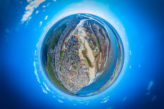 Helicopter drone shot. Aerial photography of a small village with villas and cottages, river, beach,forest and roads. Panoramic city 360  shot from above photo
