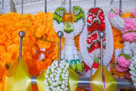 equipment for worship There is a garland made of realistic flowers. photo