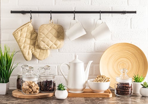 beautiful modern interior of ecologically clean kitchen. various kitchen utensils on a marble countertop. front view. kitchen background. photo