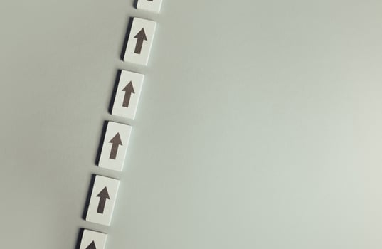 Row of arrows. Set course, make your way. Moving forward, step by step. New opportunities. Strategic planning. Motivation, self-development. Copy space, place for text photo