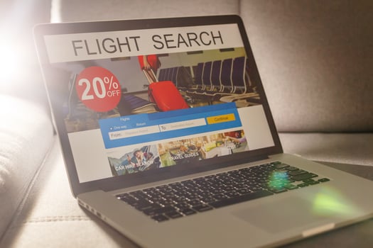 Airplane in laptop screen. Mixed media photo