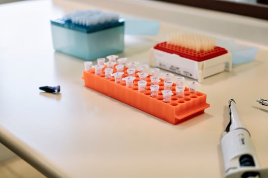 Top view of pipette and test tubes in a laboratory. photo