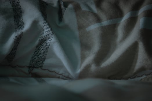 texture of a sleeping pillow before being made up in the morning photo