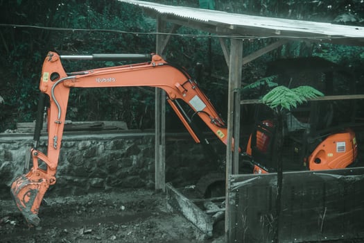 inactive tractor was in a small hut photo