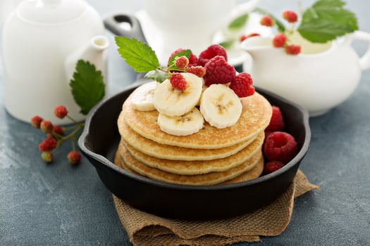Fluffy buttermilk pancakes with bananas photo