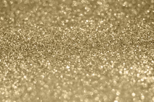 Abstract gold glitter sparkle texture background photo