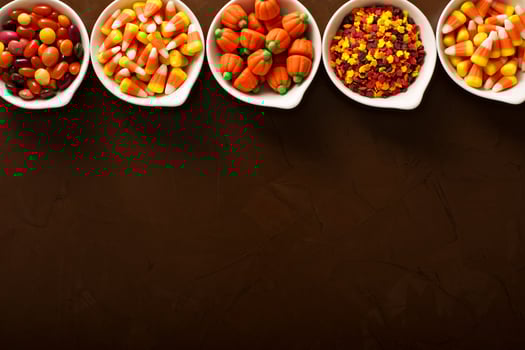 Halloween candy in white bowls photo