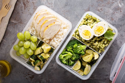 Healthy meal prep containers with chicken and rice photo