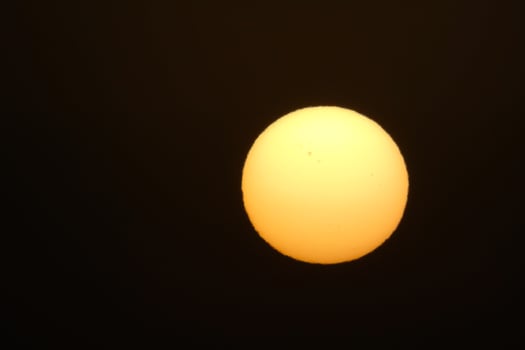 sun the sun, at sunset at the end of the day, essential for the life of the planet photo