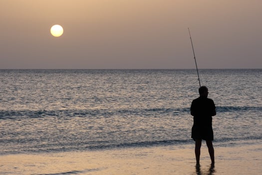 Beach shore fishing, traditional fishing as a hobby photo