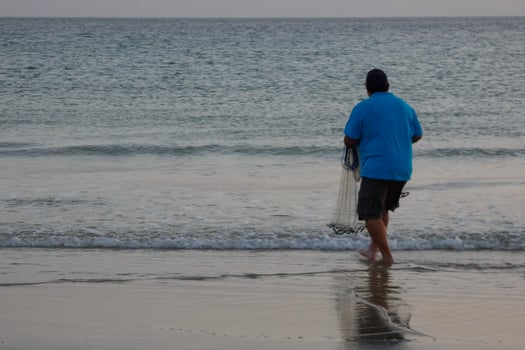 Beach shore fishing, traditional fishing as a hobby photo