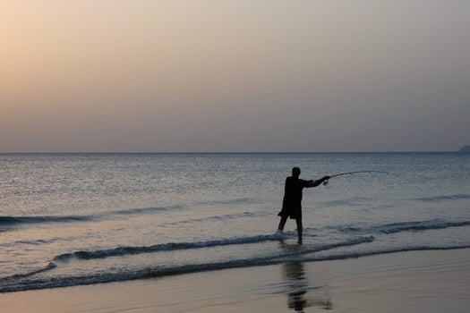Beach shore fishing, traditional fishing as a hobby photo