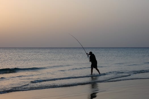 Beach shore fishing, traditional fishing as a hobby photo