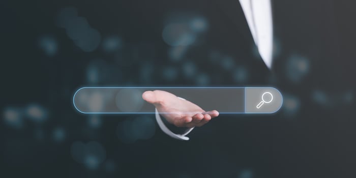 search icon on virtual screen in the hands of marketers,Using Search Console with your website web search concept,information search technology search engine optimization photo
