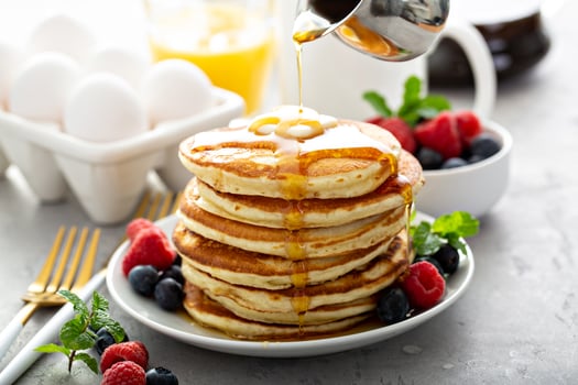 Fluffy buttermilk pancakes with syrup photo