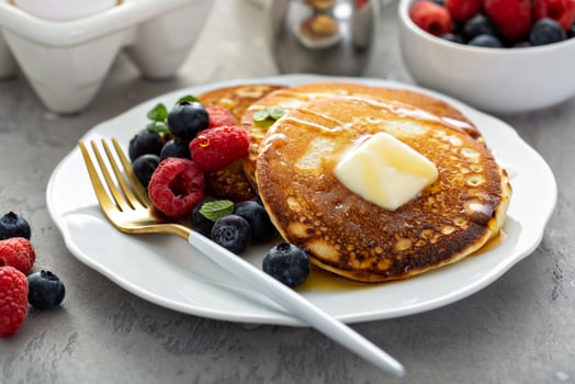 Fluffy buttermilk pancakes with syrup photo