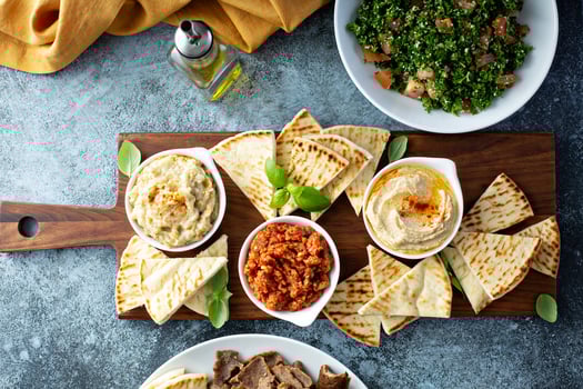 Mezze board with pita and dips photo