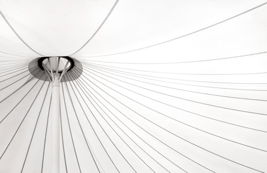 Canvas roof and large structure Stretched between buildings photo