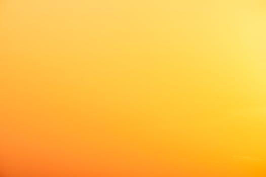 beautiful gradient orange clouds and sunlight on the blue sky perfect for the background, take in everning,Twilight photo